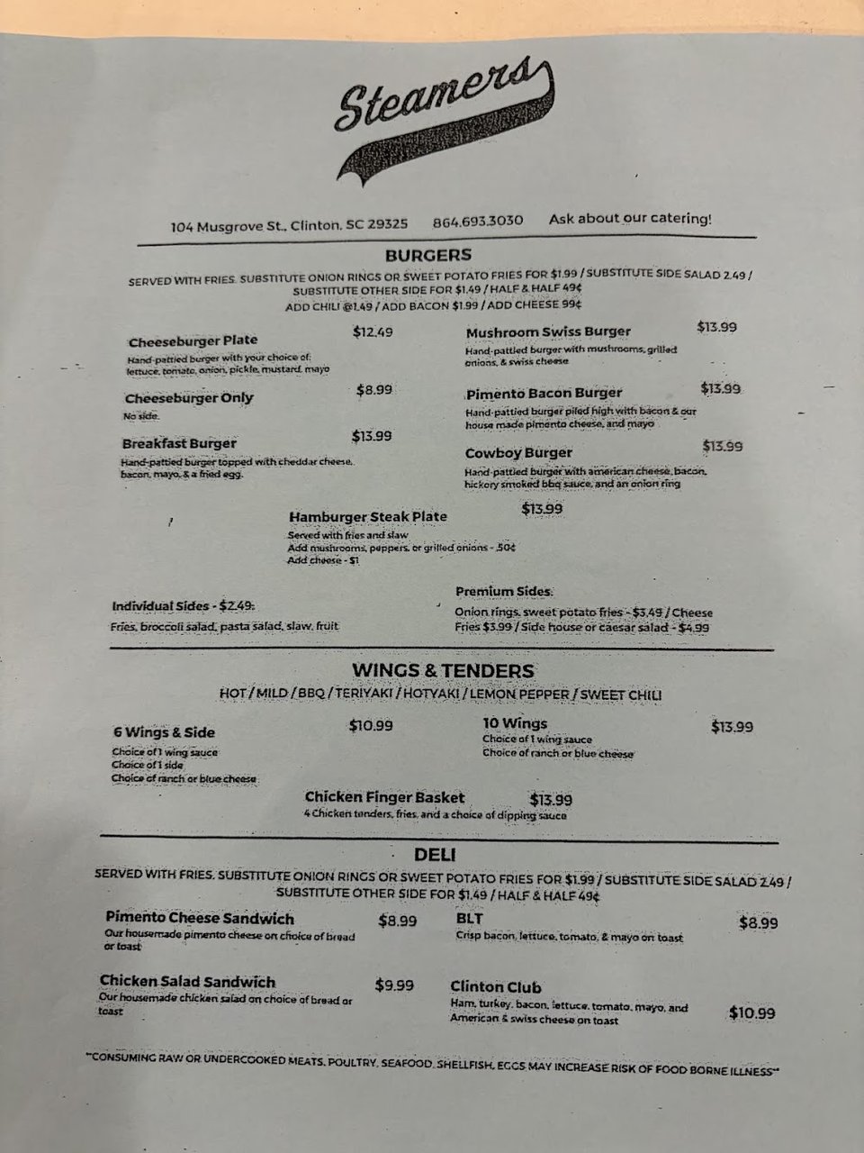 Printed menu for hamburgers, hotdogs, sandwiches, and wraps.